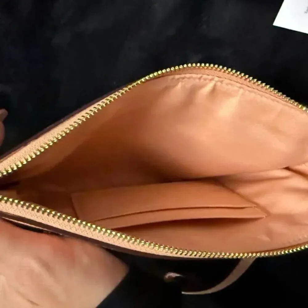 Coach Women's Large Corner Zip Wristlet Faded Blush Leather with Gold Hardware